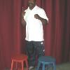 Patterson in a fighting pose by the corner stools used during his 1992 super bantamweight title-winning bout. 