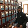 Whitaker reading plaques of fellow Inductees on the Hall of Fame Wall