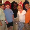 Hall director Ed Brophy and the Frawley family (Will, Jennifer and Joe) gather for a photo while touring the Hall of Fame Museum.